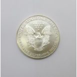 A United States 1999 1oz. fine silver one dollar coin