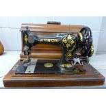 A Jones sewing machine, cased and three boxes of 78rpm records **PLEASE NOTE THIS LOT IS NOT