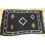 A South American embroidered throw, possibly Alpaca
