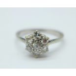 An 18ct white gold and diamond cluster ring, 3g, N