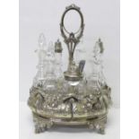 A seven bottle cruet and plated stand