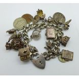 A silver charm bracelet, each link marked, 99g