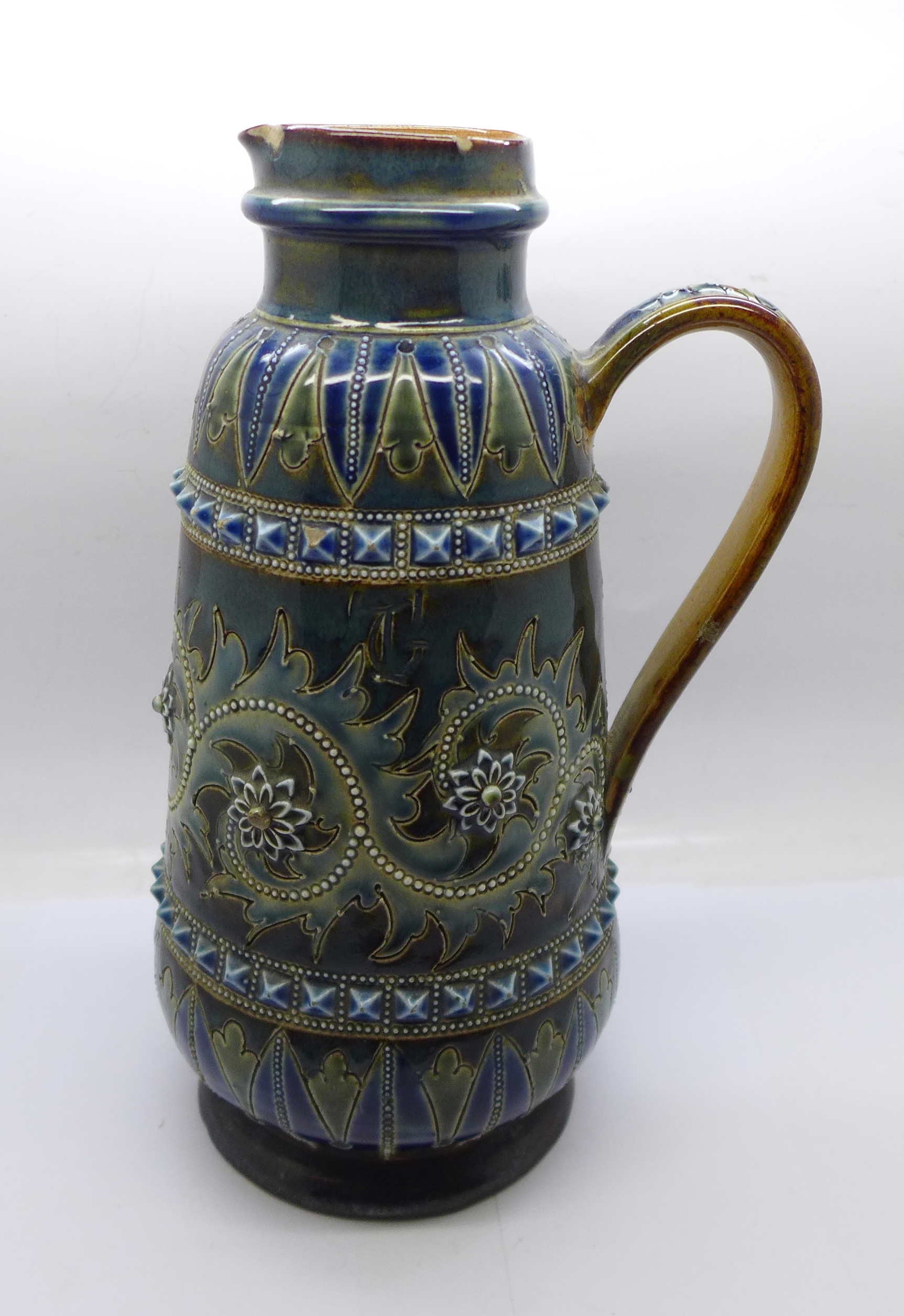 A Doulton Lambeth stoneware jug, 1877 mark, chip to rim and base, 24.5cm