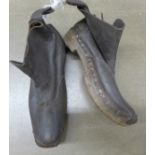 A pair of heavy industrial working men's clogs, possibly foundry or glassworks, early 20th Century