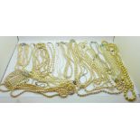 A collection of faux pearl necklaces