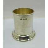 A silver stand/bottle holder, 150g, diameter 6cm