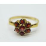 A 9ct gold and garnet cluster ring, 1.7g, M