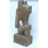 A carved wooden abstract figure sculpture, 38.5cm
