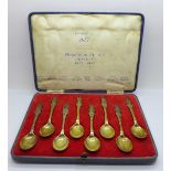 A set of eight silver gilt spoons, Monarchs of The Century 1837-1937, cased, 140g