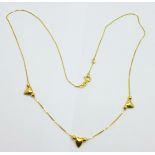 A 14ct gold heart necklace, 1.8g, 43.5cm
