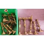 A collection of brass candlesticks **PLEASE NOTE THIS LOT IS NOT ELIGIBLE FOR POSTING AND PACKING**