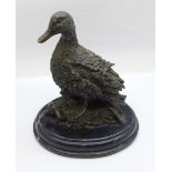 A cast bronze model of a duck
