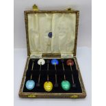 A cased set of six hallmarked silver and enamel coffee bean spoons, enamel a/f on yellow and royal