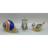 Three Royal Crown Derby paperweights, Snail, Cat with silver stopper and a Goldcrest with gold