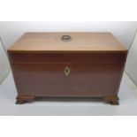 A George III inlaid mahogany tea caddy with fitted hinged compartments, lacking centre jar, 30 x