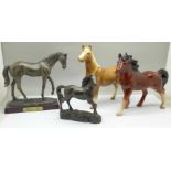 Four figures of horses