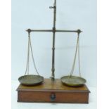 A mahogany and brass set of balance scales