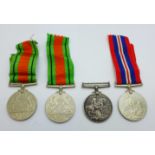 A WWI British War Medal to 2437 Pte. C.E. Walker Yorkshire Regiment and three WWII medals