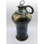 A Royal Doulton stoneware flagon, 22cm