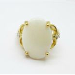 A 9ct gold and opal ring also set with two white stones, 6.4g, N, opal 18mm x 12mm