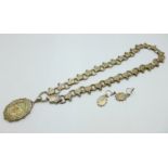 A Victorian hallmarked silver photograph pendant with gold applied decoration and matching earrings,
