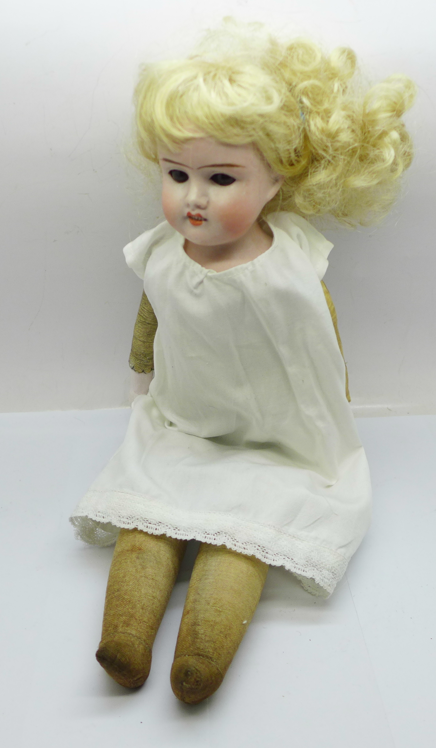 A bisque head doll, open/closed eyes, open mouth, 36cm