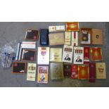 A large collection of cigars, including two sealed packs of King Edward Invincible, Henri Wintermans