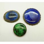 A Ruskin brooch, a/f, and two similar brooches, (one marked sterling silver)