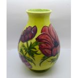 A Moorcroft Anemone vase on a yellow ground, 19.5cm