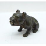 A novelty figural dog desk-top cigar cutter holder, height 42mm