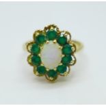 A 9ct gold, opal and emerald ring, 3.7g, P, opal cracked