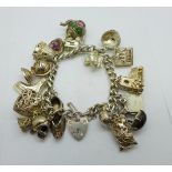 A silver charm bracelet, 105g