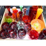 A collection of coloured glass vases, sundae dishes, cranberry wines, etc.