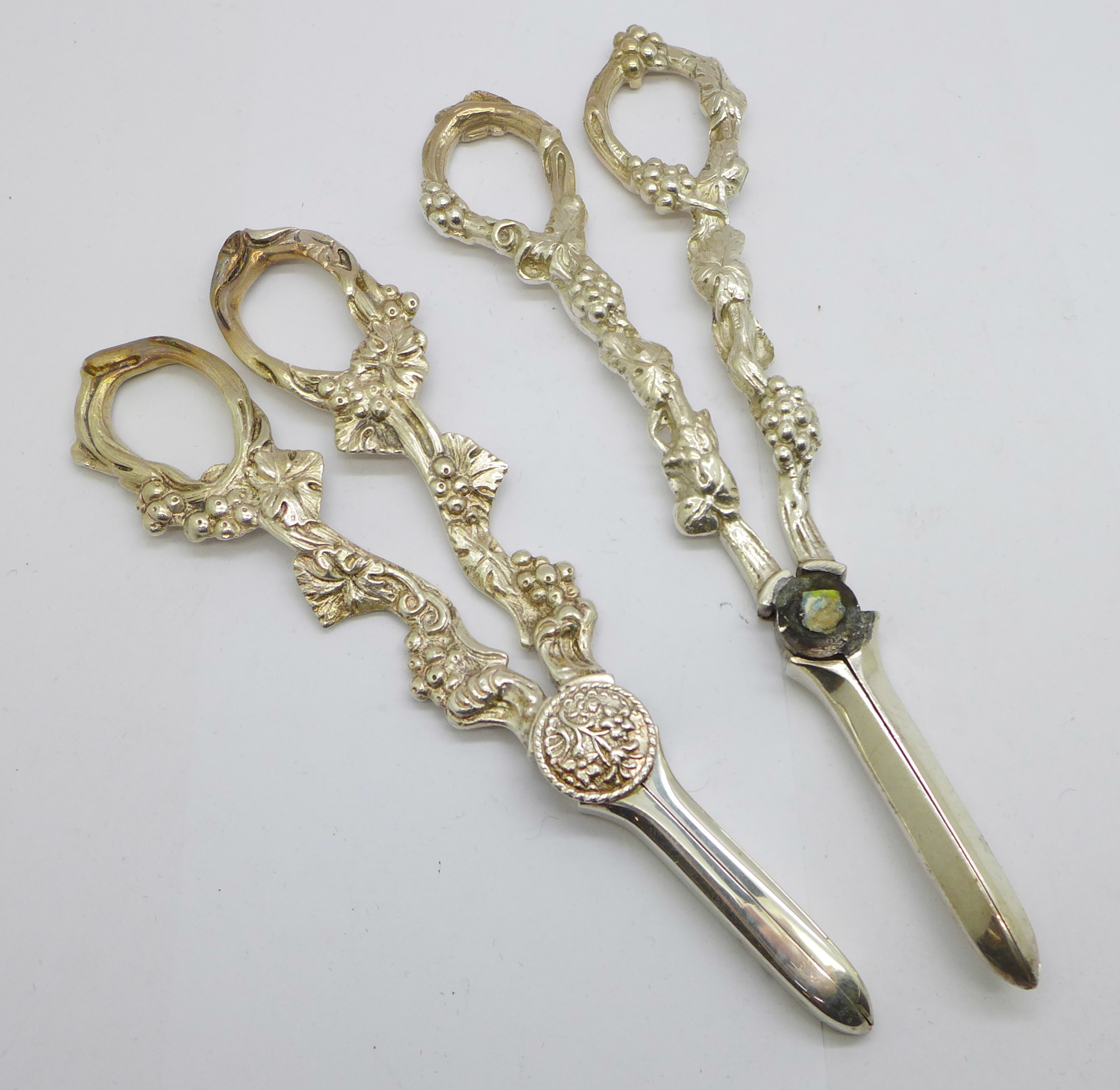 Two pairs of grape scissors, one a/f
