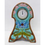 An Art Nouveau style ceramic clock, 29.5cm, movement requires mounting