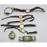 An early 20th Century silver cased wristwatch, a Roamer, a lady's Pilot and other lady's