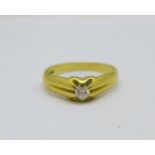 An 18ct gold diamond solitaire ring, 4.9g, V