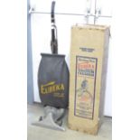 A vintage 1920's Eureka vacuum cleaner, with original box