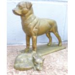 Two brass models, Rottweiler and sleeping fox
