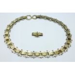 A Victorian white metal and gilt collar, with spare link, 41.5cm