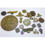 A death plaque, John Walker, military badges including a silver and enamel Royal Dragoons badge, a