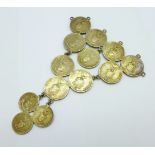 A large coin necklace made from thirteen 1944/45 United States Filipinas coins