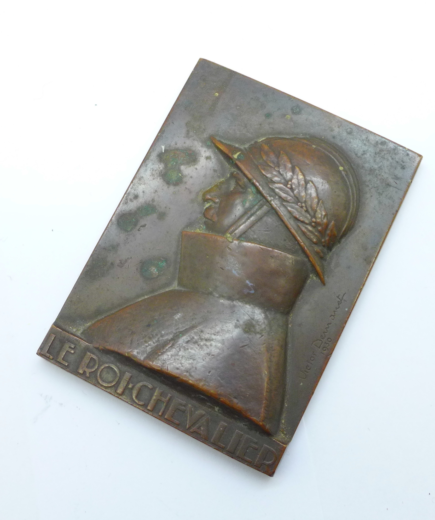 A bronze plaque, signed Victor Demanet 1930, Le Roi Chevalier 1914-1918, Belgium, 53mm x 74mm