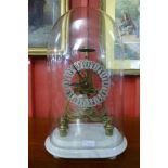 A Victorian glass domed brass five spoke wheel fusee skeleton clock, on marble base, 50cms h