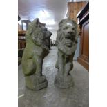 A pair of concrete garden figures of lions