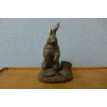 A Black Forest carved softwood rabbit inkwell, a/f