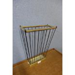 A mid 20th Century cast iron and brass stick stand