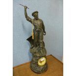A large 19th Century spelter figural mantel clock, titled Cod Fishing, 75cms h