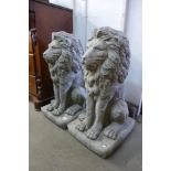 A pair of large concrete garden lions, 86cm h