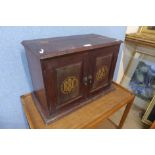 A B.B.C mahogany table top cabinet